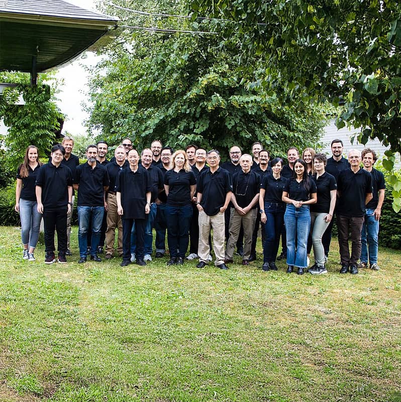 group of people in black shirts outside