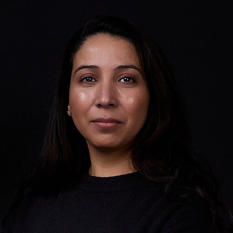 Chaïma Ben Ahmed woman's portrait against black background