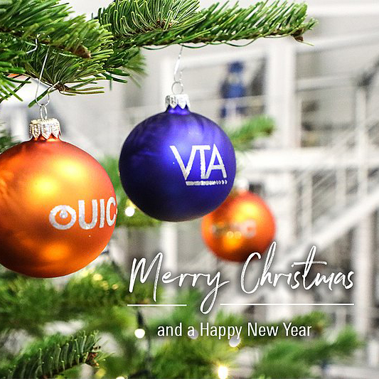Christmas tree with ball decorations with VTA and UIC logos and text 