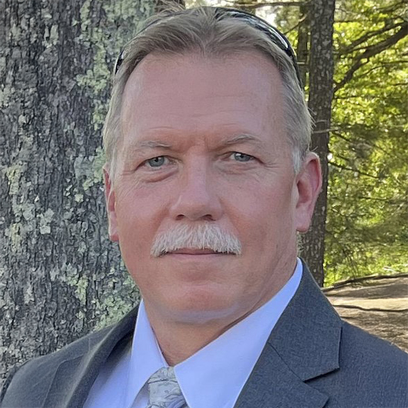 Brad Miller portrait of man with trees in background