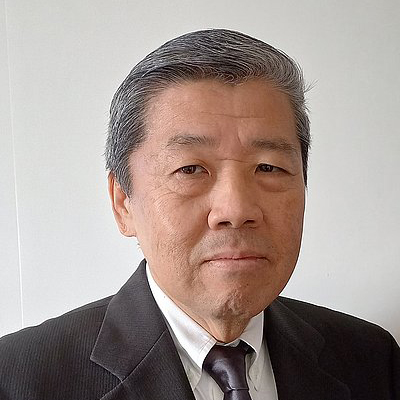 Nelson Morinishi portrait of man on gray background